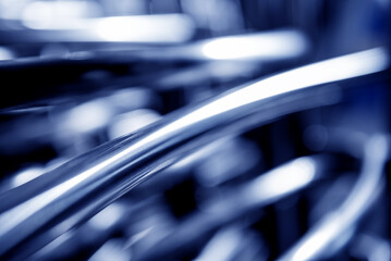 Abstract industrial background of metal pipes construction.