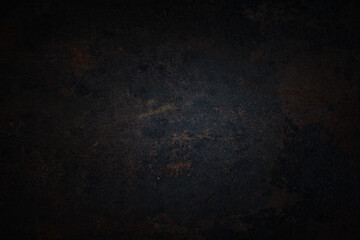 dark wall background. Empty workplace, in front of an abstract package.