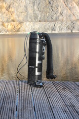Taucherflasche am See.
