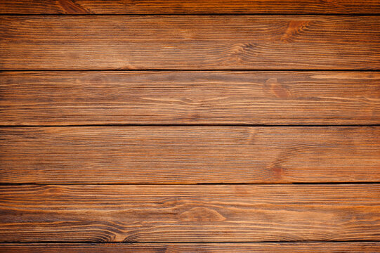 wooden dark brown background.  walnut color