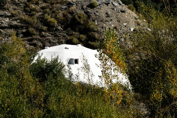 Buddhist meditation igloo house among greenery