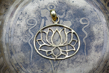 Brass metal boho pendant in the shape of lotus