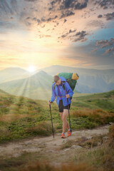 Fototapeta premium Hiker on the top in Carpathians mountains. Travel sport lifestyle concept