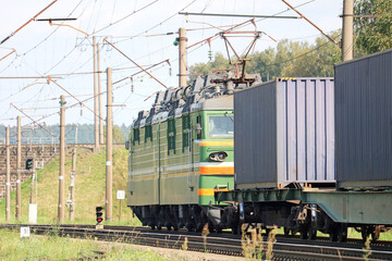 Obraz premium container cargo transportation by rail 