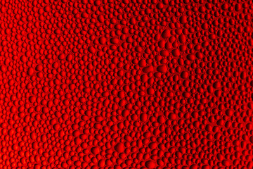 Red macro water drop surface