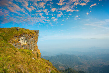 Beautiful landscape nature on peak mountain with sunset in winter at viewpoint Phu Chi Fa or Phu chee fah Forest Park in Chiang Rai , Thailand