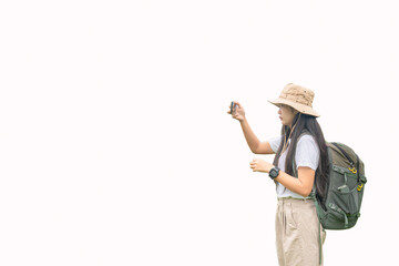 Traveler using smartphone camera to take selfie or shooting street