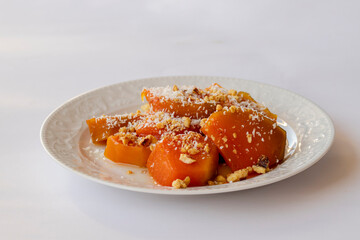 Pumpkin dessert with sugar, pecan