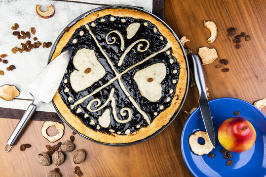 Czech traditional cake "kolac" on a wooden table