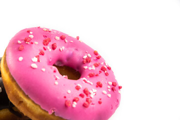 Macro photo of glazed sweet donut with strawberries on white isolated background