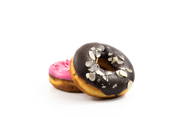 Delicious perfect donuts glazed with strawberries on white isolated background
