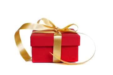 Red gift box with gold ribbon and bow on white background