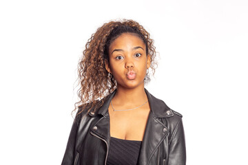 Portrait of young beautiful lady with funny faces, posing for  the camera on isolated background.