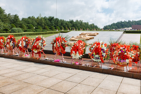 Pyongyang,North Korea-July 27, 2014: Wreaths to the fallen revolutionists at the memorial cemetery to revolutionaries in Pyongyang.