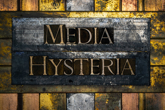 Media Hysteria text message on textured grunge copper and vintage gold background