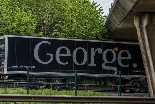 Northampton, UK - May 10th 2019: asda george box truck on uk motorway in fast motion
