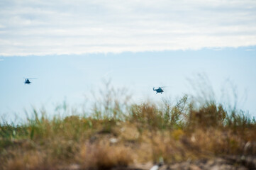 Military helicopter flying during exercise