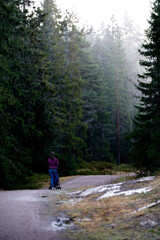 Family walk in the forest.  