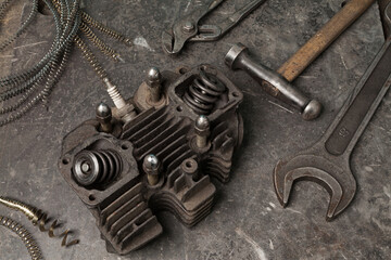 Old tools set on a vintage metallic background