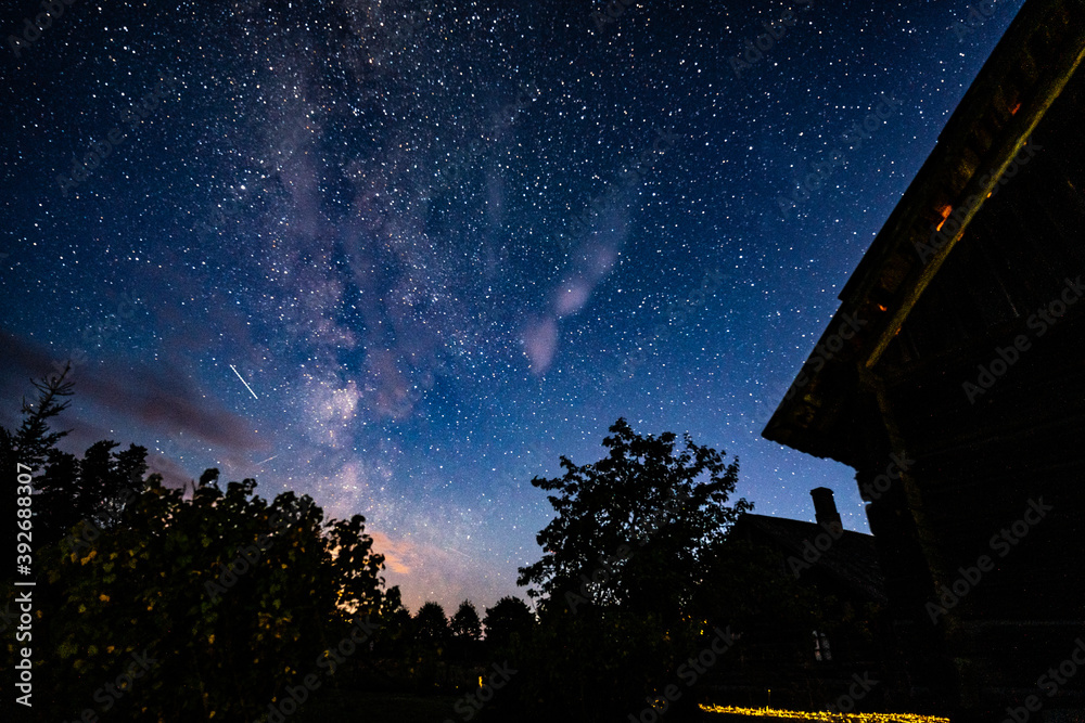 Wall mural overhead milky way with stars in clear summer night. country side.
