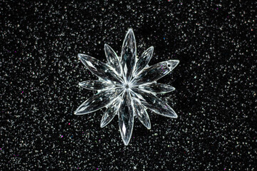 Christmas snowflake background, dark blue glitter background, selective focus,  free copy space