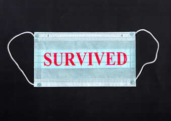 Protective mask with inscription survived during quarantine