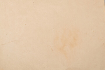 Old crumpled beige paper background.