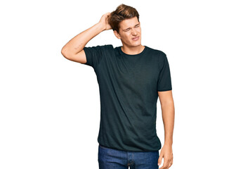 Fototapeta premium Handsome caucasian man wearing casual clothes confuse and wonder about question. uncertain with doubt, thinking with hand on head. pensive concept.