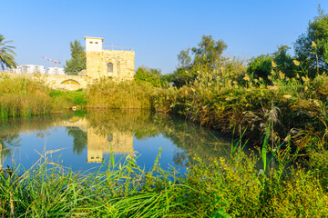 Fototapeta na wymiar Ancient Flour Mill, and a pond, En Afek nature reserve