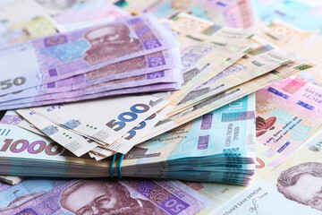 Closeup view of Ukrainian money as background. National currency