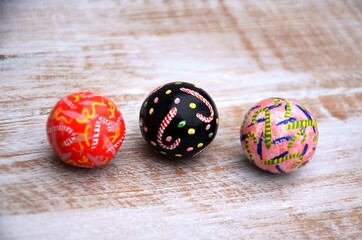 Colorful big ball beads with bright holiday pattern. Large Xmas wood beads set