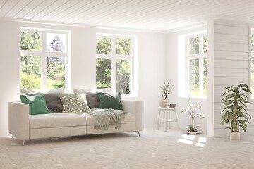 White living room with sofa and summer landscape in window. Scandinavian interior design. 3D illustration