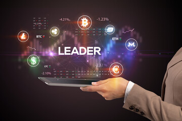 Close-up of a touchscreen with LEADER inscription, business opportunity concept