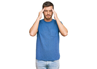 Fototapeta premium Handsome caucasian man wearing casual clothes with hand on head for pain in head because stress. suffering migraine.