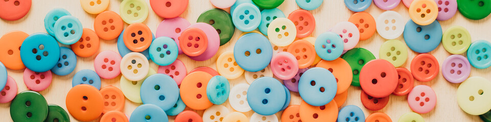 Multi-colored Plastic Buttons. Long Banner
