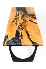 High angle view of a wood and epoxy table on a white backdrop