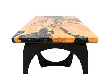 Side view of a wood and epoxy table on a white backdrop