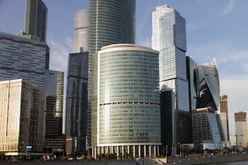 Fototapeta premium Moscow / Russia – 09 01 2020: Moscow city tall towers on blue sky background, modern business center facade glass wide view at summer day