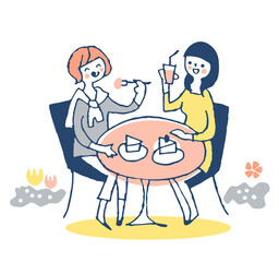 オープンカフェでくつろぐ2人の若い女性