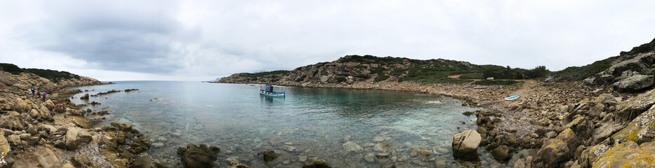 fishing boat at cala del vino, alghero, sardinia, italy