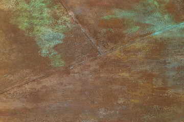 Old brown plastered wall with spots. Space for text