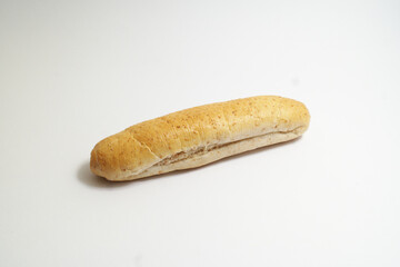Mini baguette bakery made from graham flour, typical baker of Slovak republic, on the white...