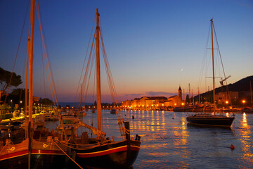 Sunset light over Omis resort on the Dalmatian Coast, Croatia, Europe