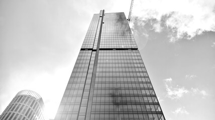 Obraz premium Abstract modern architecture with high contrast black and white tone. Architecture of geometry at glass window - monochrome. Black and white.