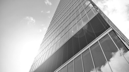 Fototapeta na wymiar Abstract modern architecture with high contrast black and white tone. Architecture of geometry at glass window - monochrome. Black and white.