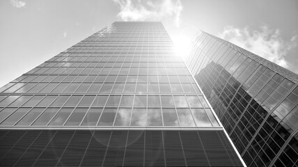Fototapeta premium Abstract modern architecture with high contrast black and white tone. Architecture of geometry at glass window - monochrome. Black and white.
