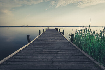 Fototapeta premium Bootssteg am Steinhuder Meer