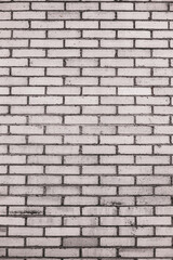 An abstract, old, beige brick wall, can be used as a background