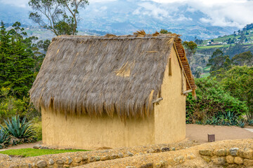 Fototapeta na wymiar Ecuador, in the ruins of the Inca village of Ingapirca, one of the typical restored houses.