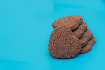 heart shaped cookies on a blue background